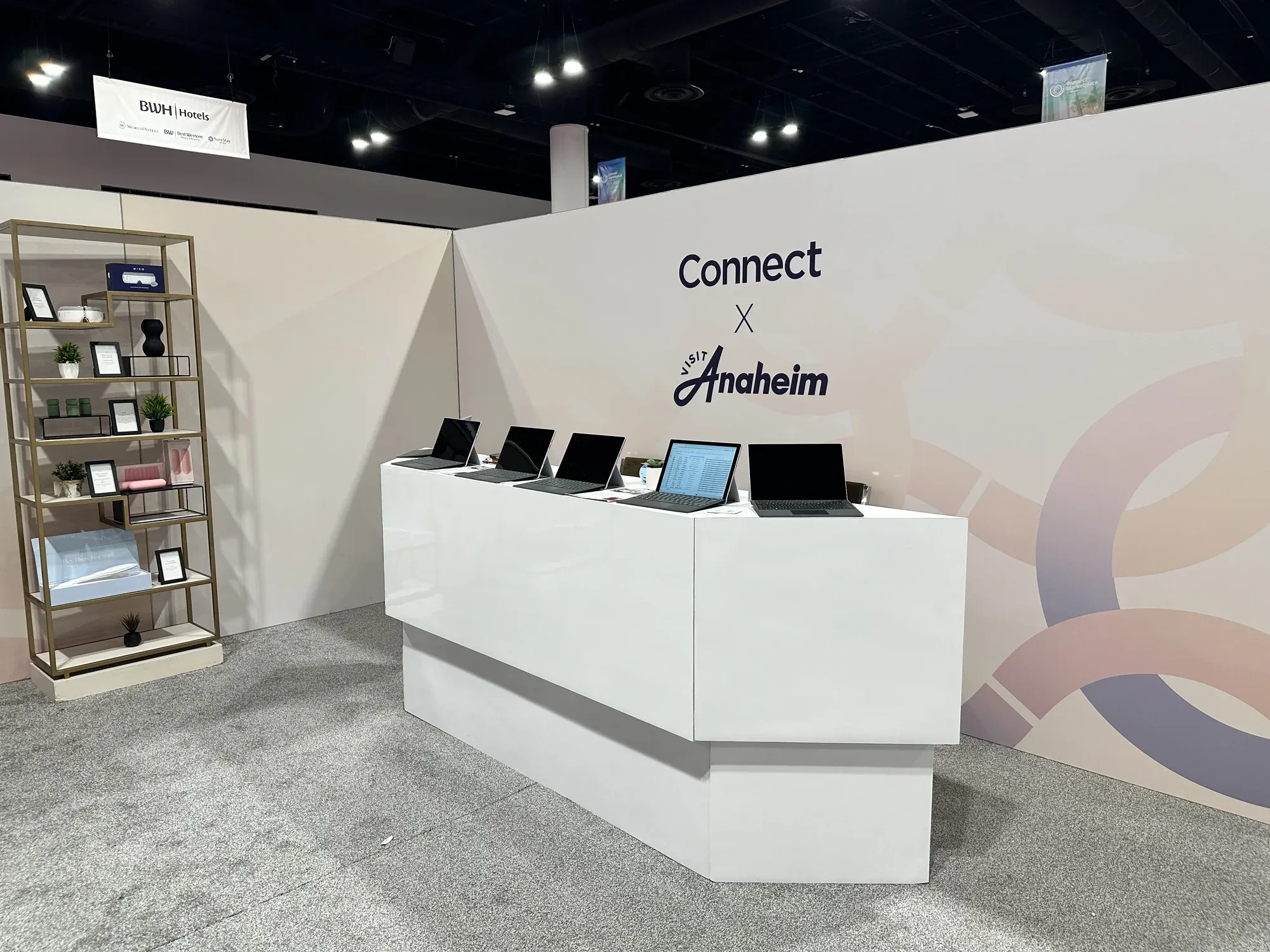 Laptop kiosks where guests personalized their gifts in the Visit Anaheim Gifting Suite