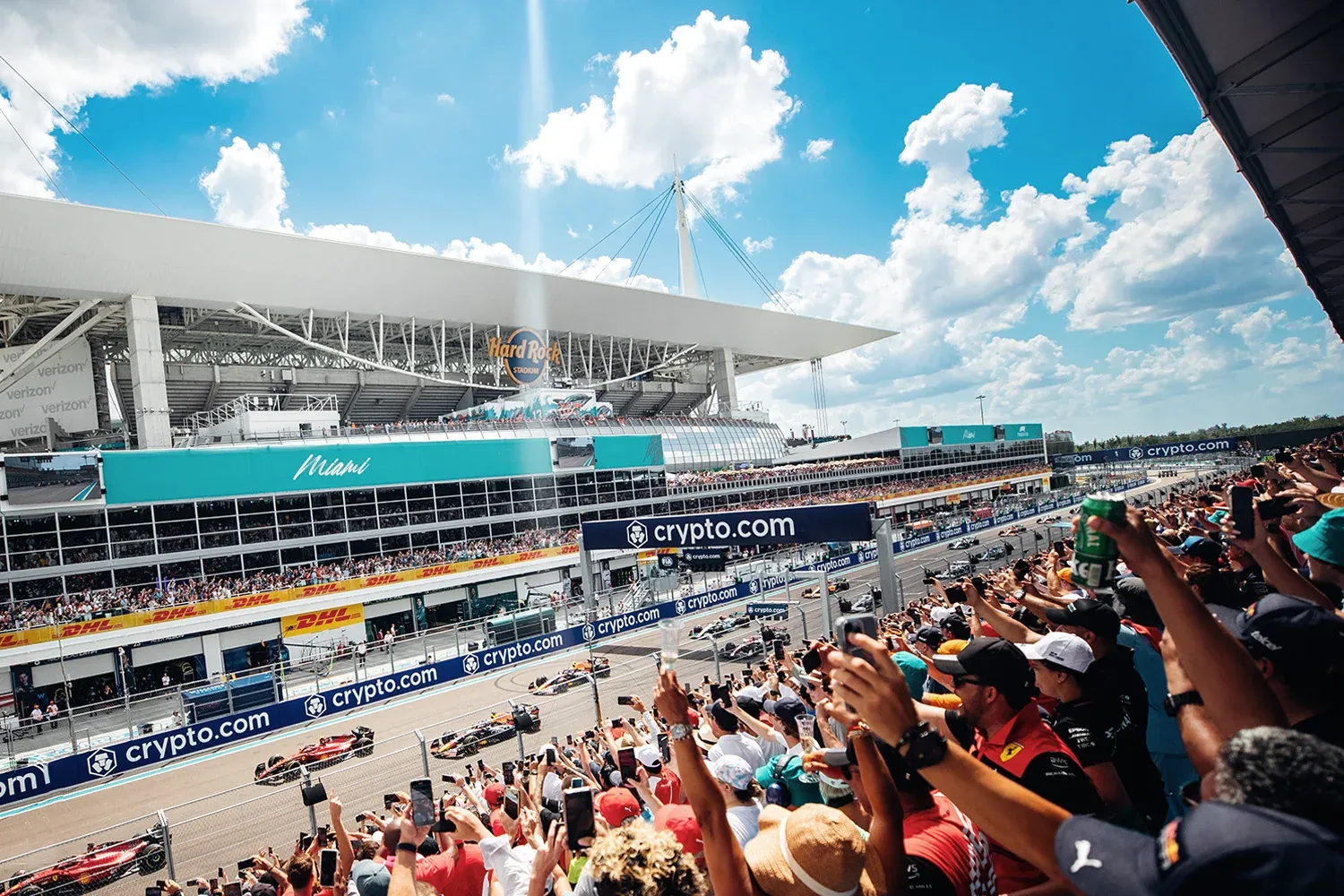 Fans in the grandstand cheering at the Formula 1 Miami Grand Prix