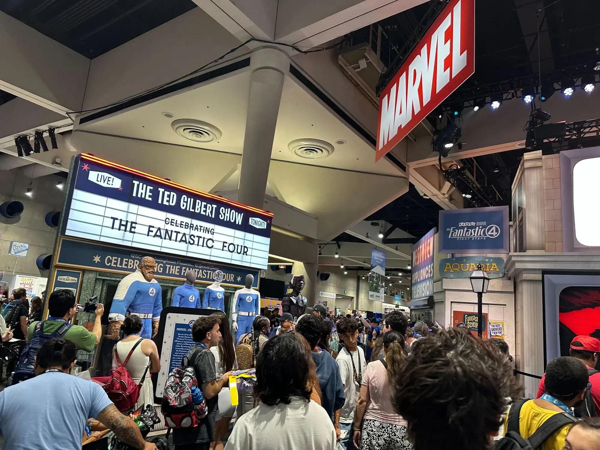 Crowds of fans at the Marvel booth at San Diego Comic-Con 2025, beneath a Fantastic Four marquee