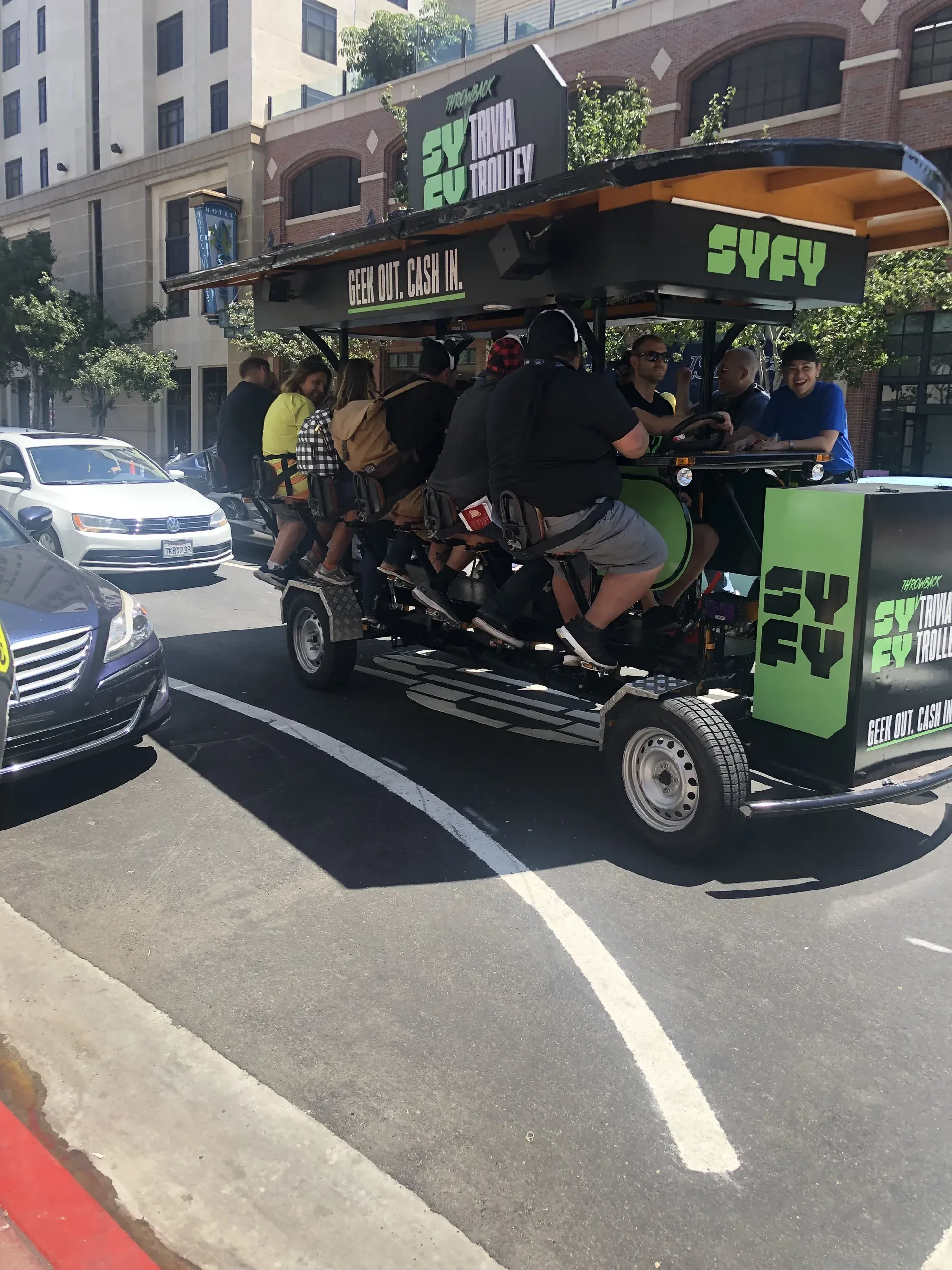Fans riding the SYFY Trolley Trivia & Karaoke Tour through downtown San Diego