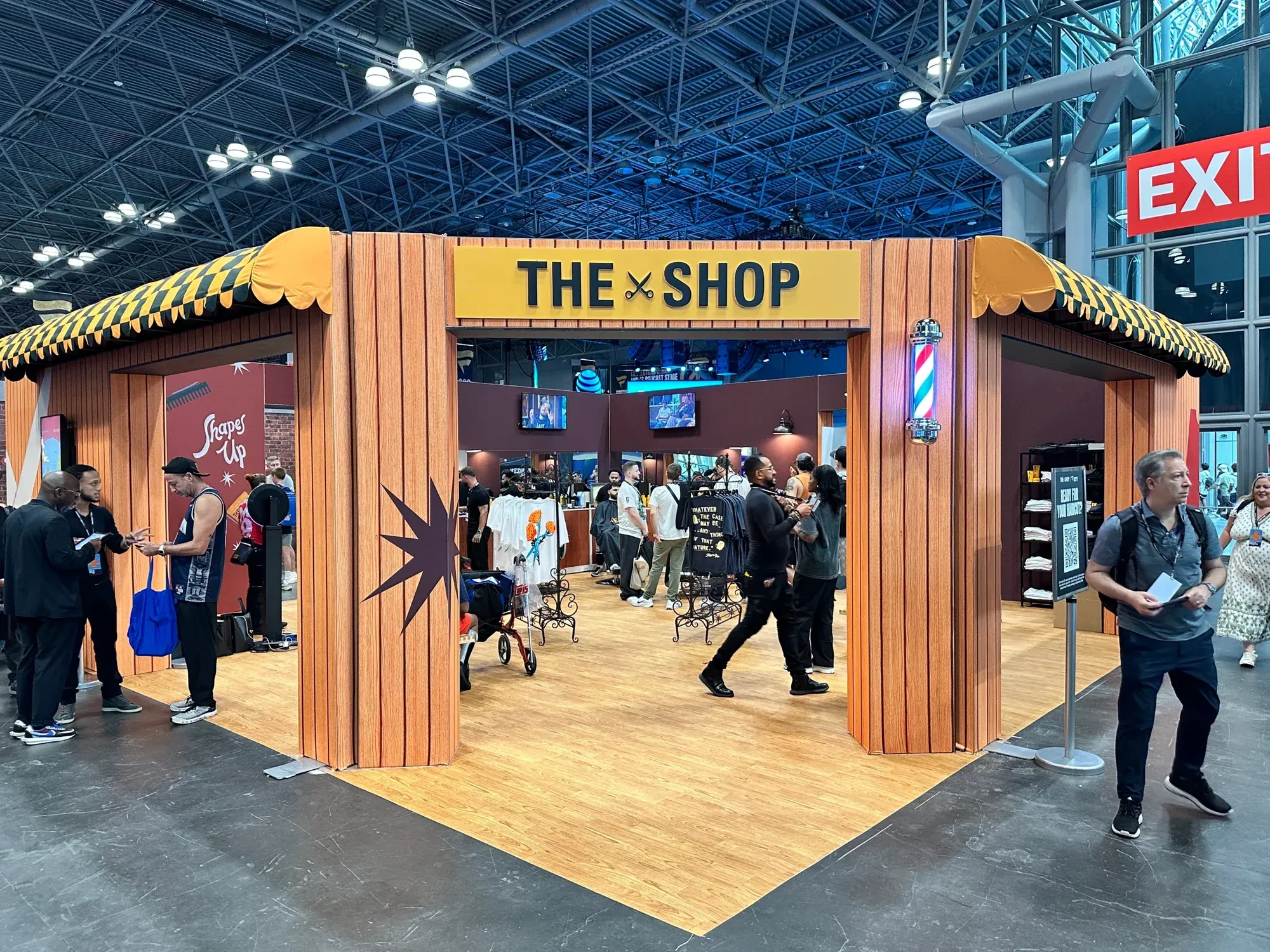 The Shop barbershop activation on the show floor at Fanatics Fest NYC 2026