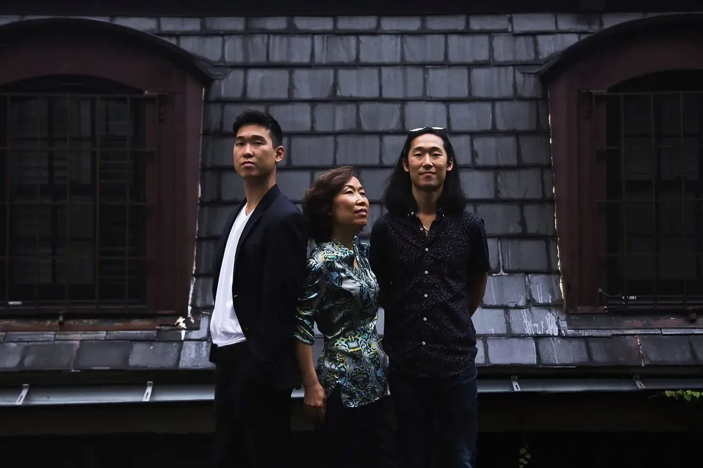 James and John Yi with their mother, Anna, in a portrait taken for the Chicago Tribune