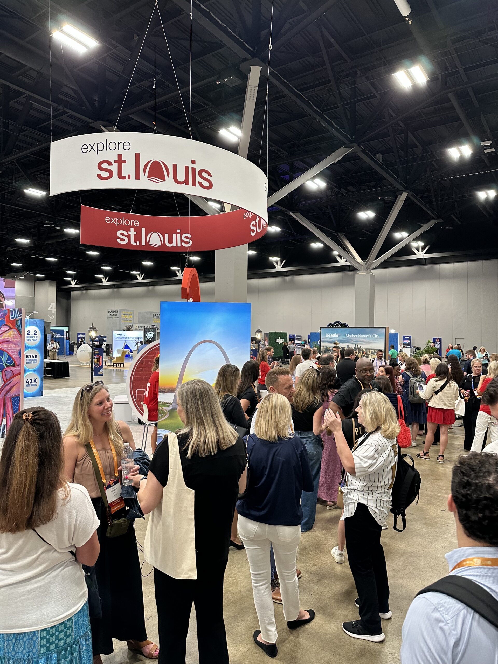 Busy tradeshow floor crowds at WEC conference with custom apparel activation